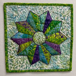 12" Mini using Petal Poetry (by Jerry Khiev for Megan Best of Best Quilter)